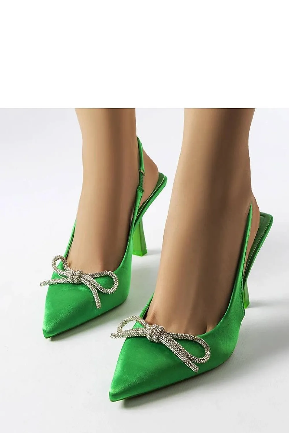 Elegant stylish beige heels with a bow